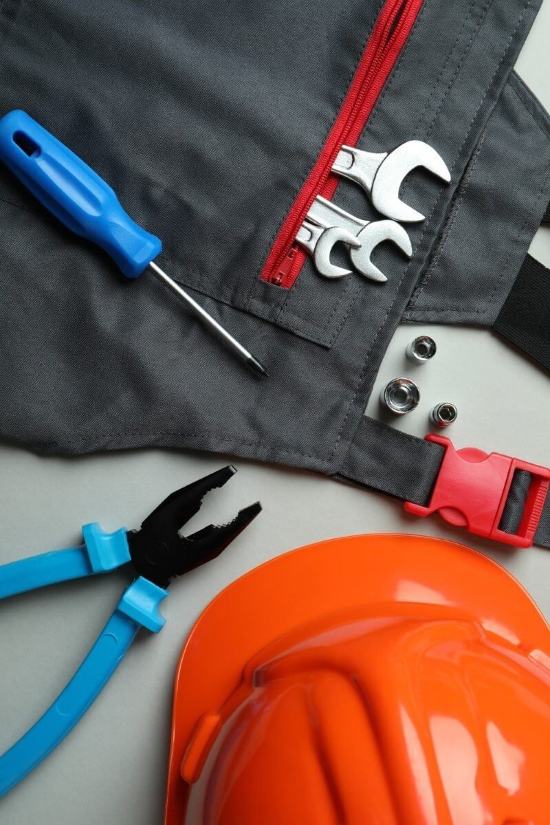 overalls hard hat and tools on light gray backgro 2025 03 26 18 05 01 utc rotated 1